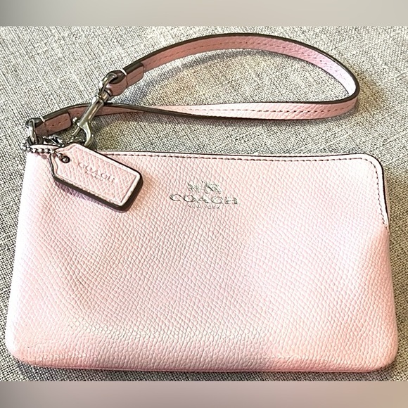 Coach Handbags - Coach Light Pink Leather Wristlet